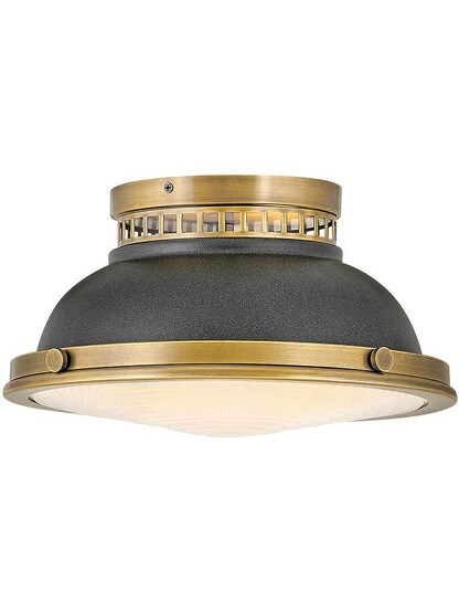Emery 2-Light Flush Mount in Heritage Brass with Aged Zinc.
